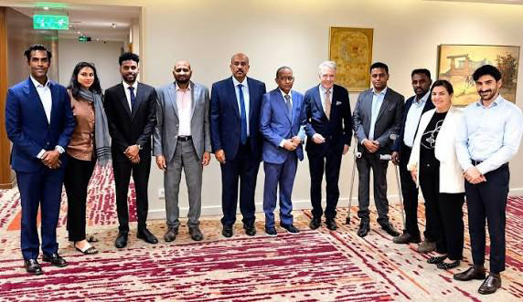 Members of a Sudanese civilian delegation and Norwegian officials posing for a group photo