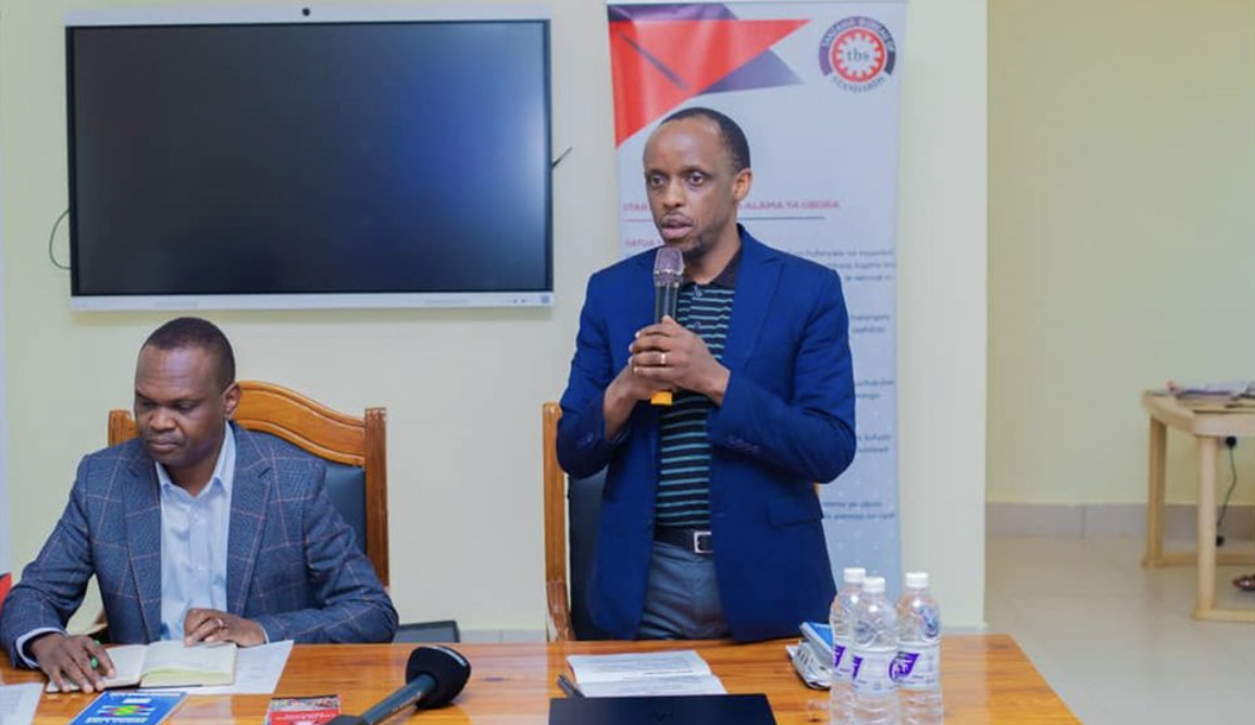 A Tanzania Bureau of Standards official addressing traders at an awareness session